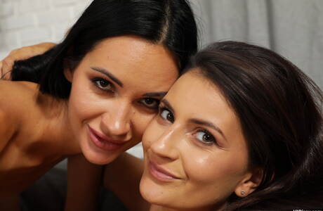 VIPissy xxx picture collection featuring Tiny Tina and Megan Venturi in watersport session